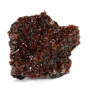 A remarkable rhodochrosite specimen featuring sharp scalenohedral crystals with deep cherry-red to orange coloration and exceptional gemmy transparency. The 7 cm specimen from Gabon's scarce Moanda Mine displays brilliant surface luster, complete coverage, and represents a superior example from this historic African locality.