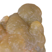 A stunning smithsonite specimen featuring lustrous botryoidal formations with an exceptional lemon-yellow coloration caused by microscopic cadmium sulfide inclusions. The 6 cm piece from this classic locality displays smooth rolling surfaces, pristine front-facing aesthetics, and represents a rare color variety of this carbonate species.