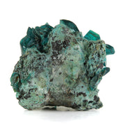 An exceptional chalcanthite specimen featuring sharp, well-formed crystals in a rich emerald-green color, rather than the typical fibrous blue-green growths. The distinct crystalline formation stands out against any matrix, showcasing a rare post-mining crystallization pattern that differs dramatically from typical chalcanthite specimens.