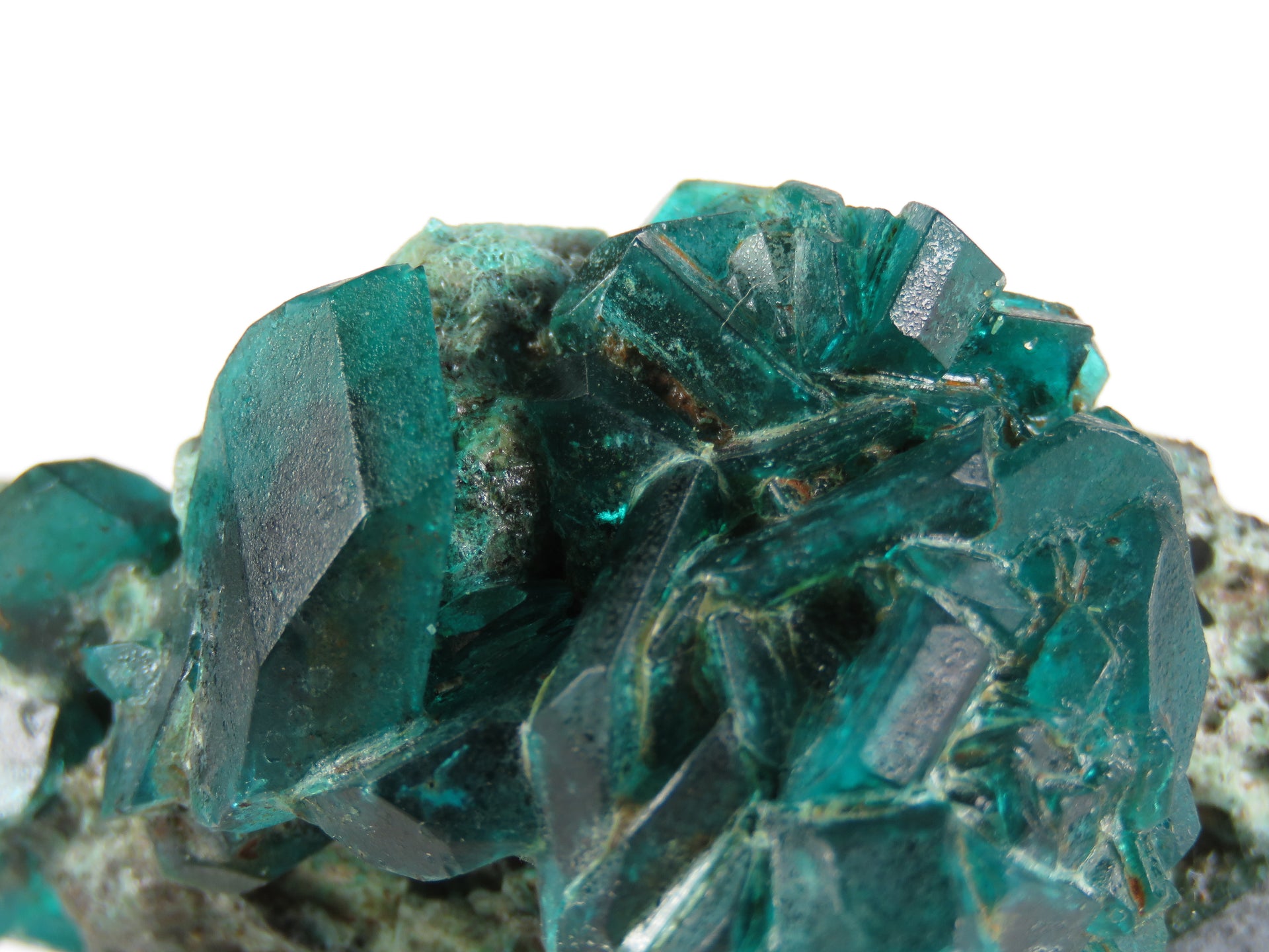 An exceptional chalcanthite specimen featuring sharp, well-formed crystals in a rich emerald-green color, rather than the typical fibrous blue-green growths. The distinct crystalline formation stands out against any matrix, showcasing a rare post-mining crystallization pattern that differs dramatically from typical chalcanthite specimens.