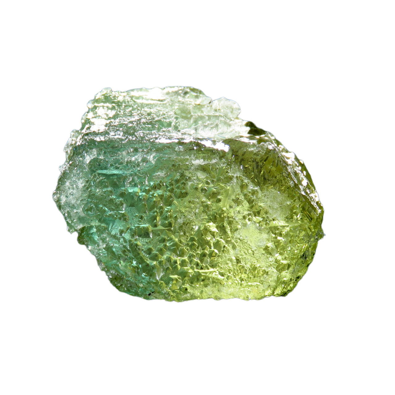 A large etched crystal of bi-color beryl showing a dramatic transition from golden yellow heliodor to blue-green aquamarine. The naturally etched surface creates a mesmerizing pattern of hexagonal pyramids, giving the 566-carat specimen a sculptural quality. The crystal appears translucent and glows when backlit, emphasizing its unique color zoning.