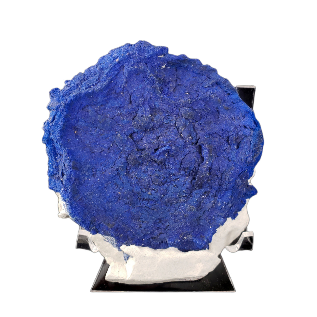 A circular 'sun-like' formation of deep blue azurite crystals. The specimen forms a nearly perfect disc shape with a rich, royal blue coloration and subtle surface texture. The edges show a thin rim of white kaolinite matrix. The azurite formation demonstrates the distinctive 'sunburst' pattern characteristic of these rare specimens.